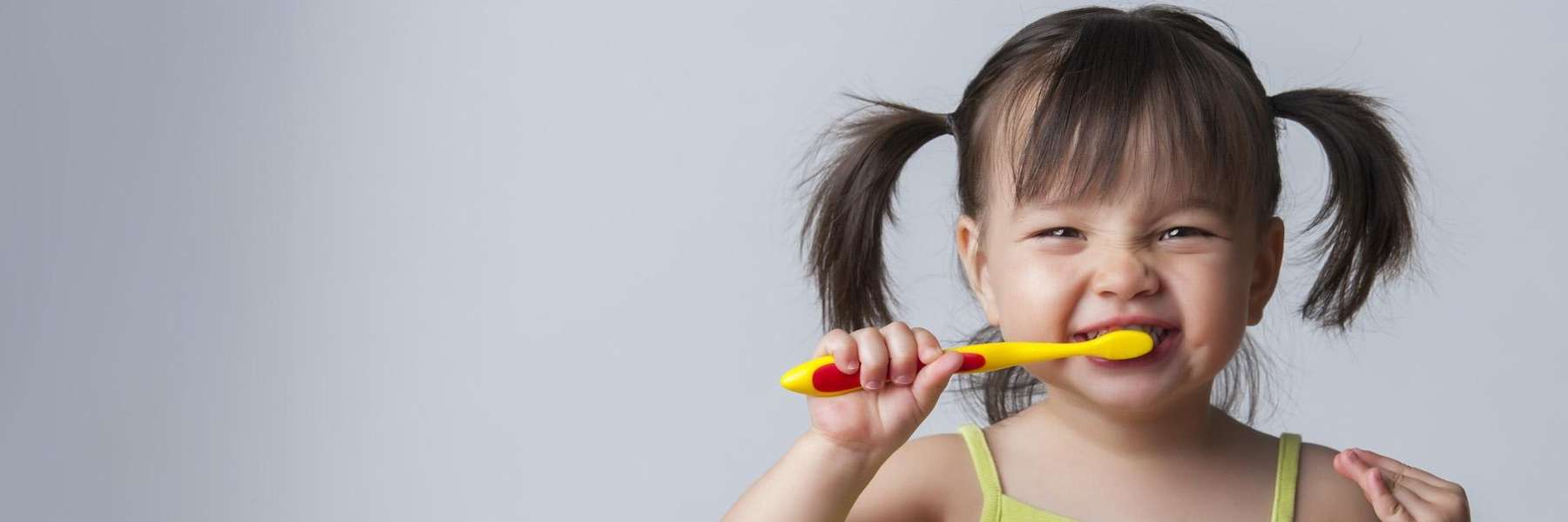 Young girl brushing teeth in Neutral Bay, NSW
