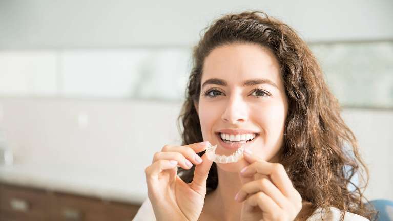 A young lady after an Orthodontic Care in Neutral Bay