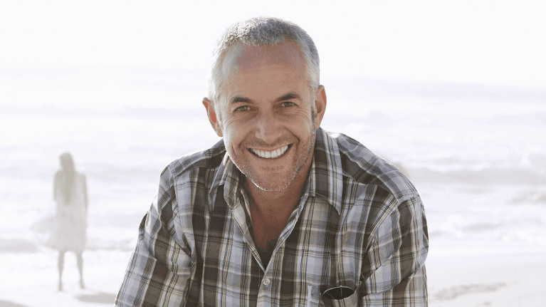 A man smiling after a Dental Care in Neutral Bay, NSW