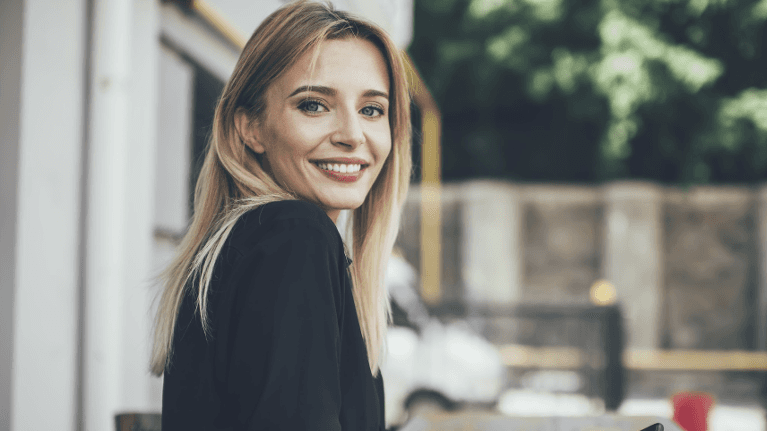 A smiling lady after dental fillings in Neutral Bay, NSW.
