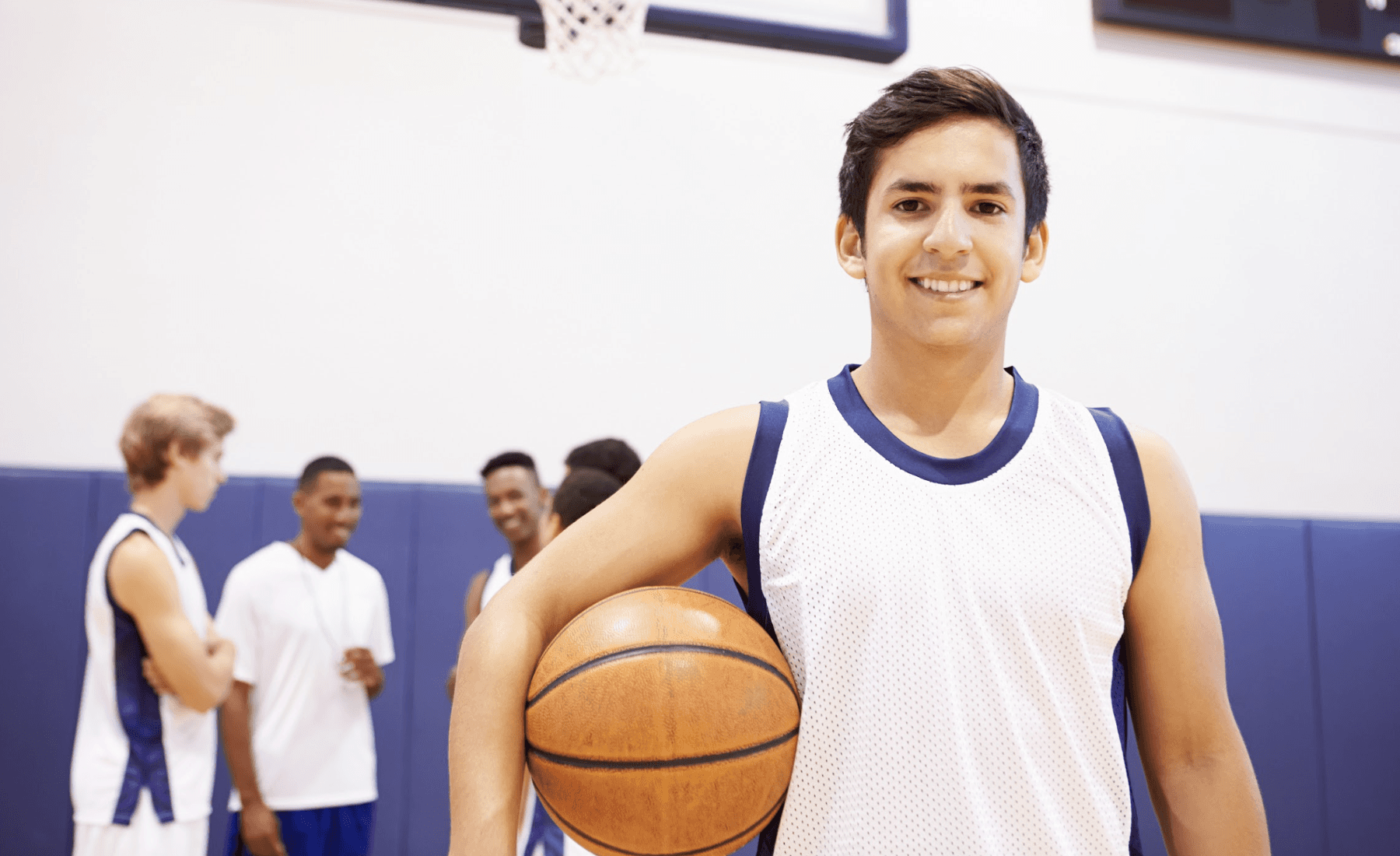 Man smiling after playing basketball in Neutral Bay, NSW