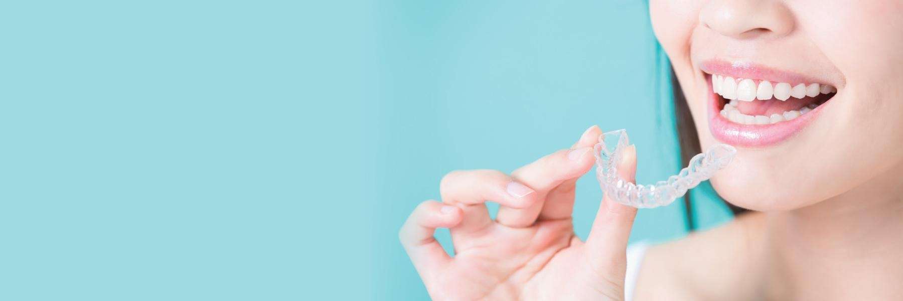 Woman with clear aligners | Neutral Bay Dentist