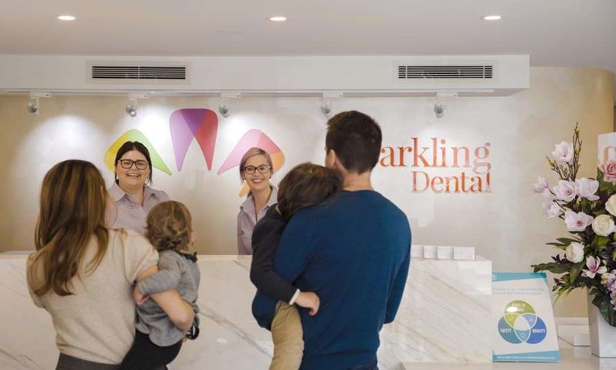 Staff welcoming clients at Sparkling Dental